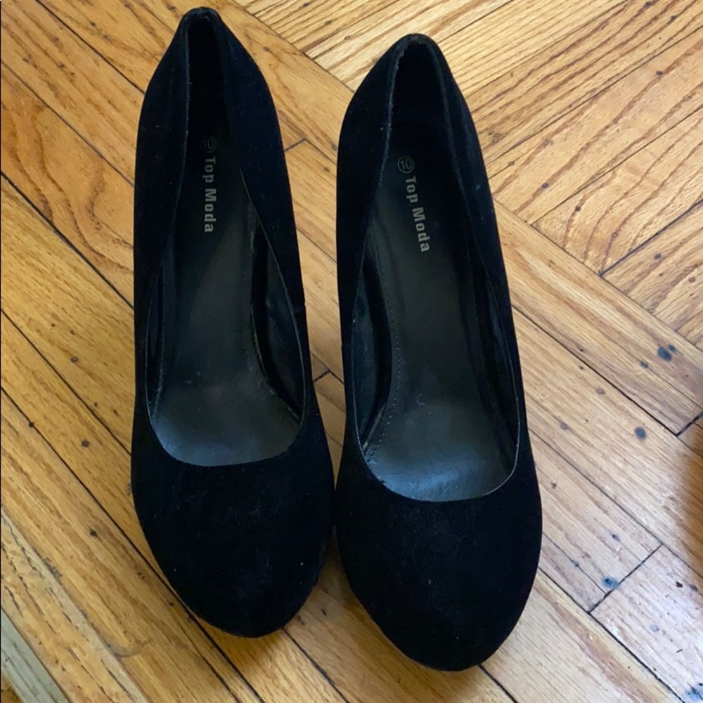 Black pumps size 10 about 2 or 2 1/2 inches